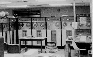 Early Univac 1107 console with tape drives behind